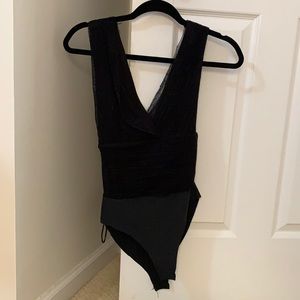 Black mesh bodysuit from Lizard Thicket Boutique!
